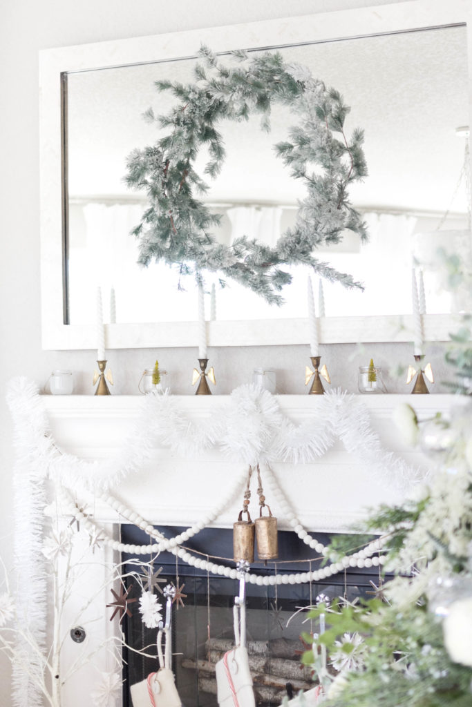 winter fireplace decorations-bohemain-glam-christmas-home-tour-iris-nacole-living-room-tourwinter fireplace decorations-felt stockings-bohemain-glam-christmas-home-tour-iris-nacole-living-room-tour