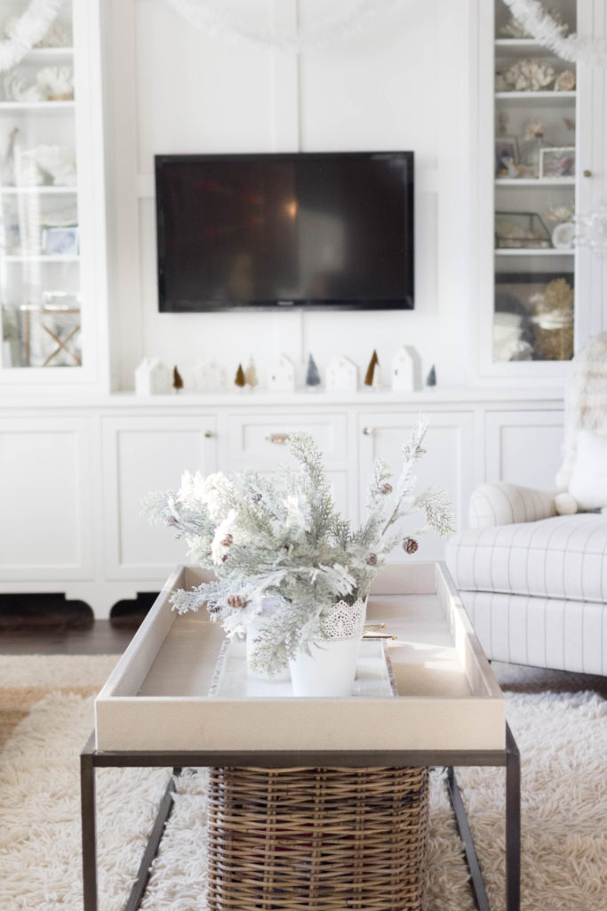 cozy winter living room coffee table decor-bohemain-glam-christmas-home-tour-iris-nacole-living-room-tour