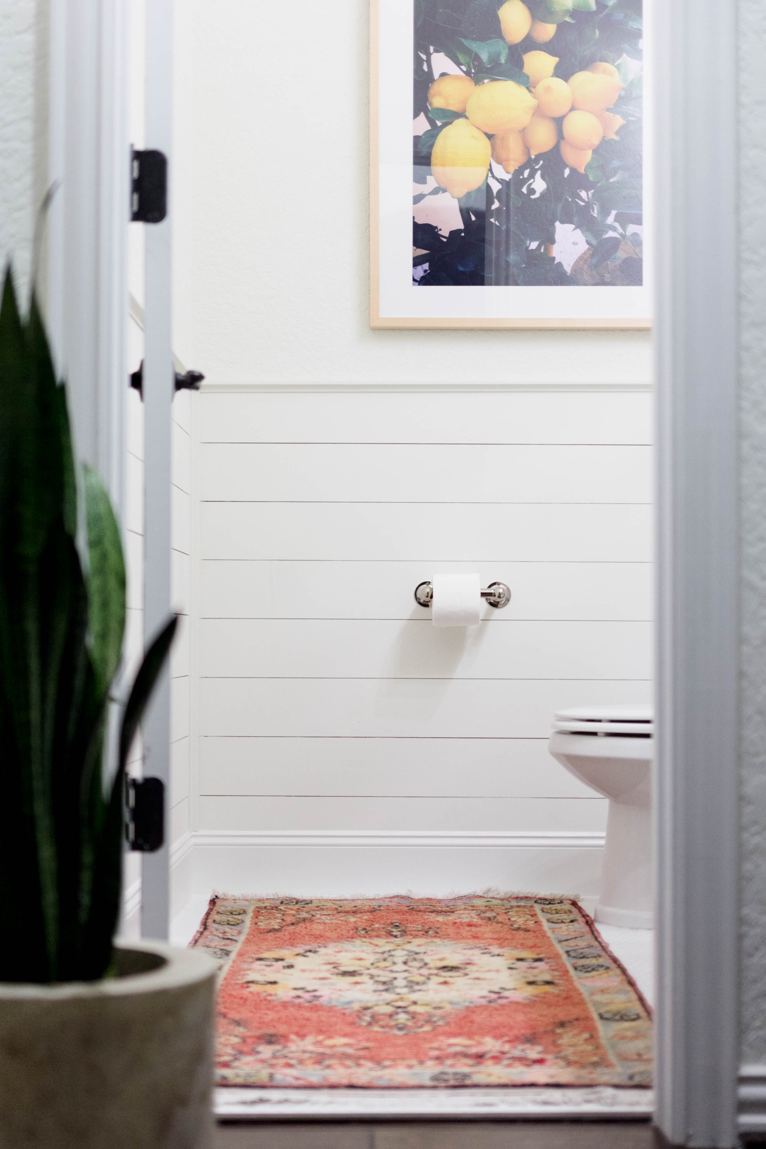 A bright and welcoming mudroom/powder room combo with a modern-casual-beach feel. Designed by: IrisNacole.com