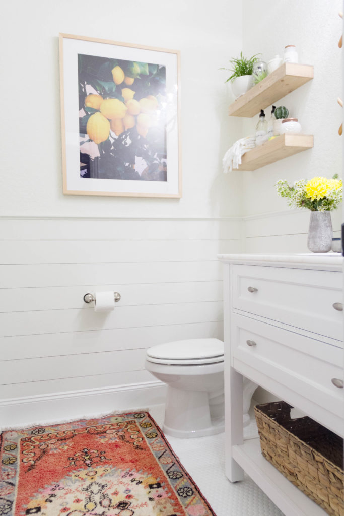 A bright and welcoming mudroom/powder room combo with a modern-casual-beach feel. Designed by: IrisNacole.com