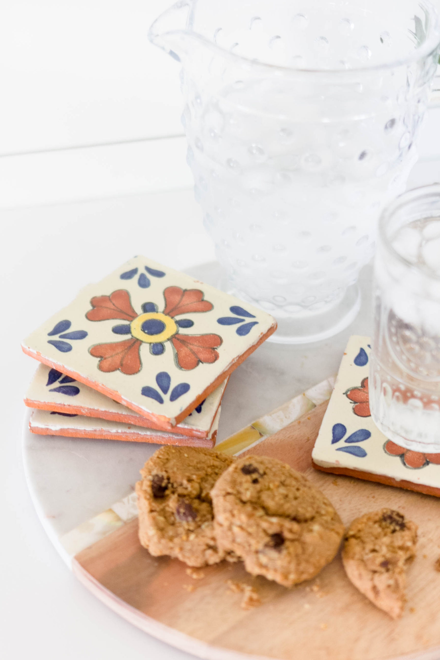 Incorporate Patterned Tile into your decor without replacing you current tile. Try this simple patterned tile coasters instead! Tutorial by IrisNacole.com