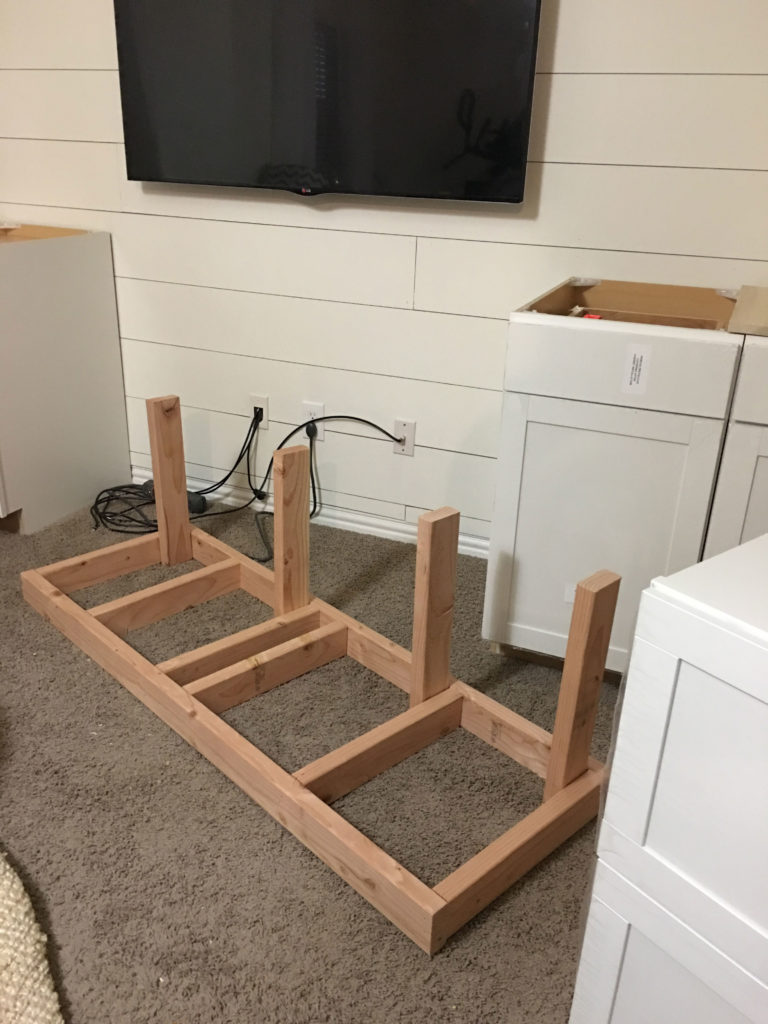 Bonus Room Makeover-DIY Builtin Storage and Bench Seat with Prefab Cabinets