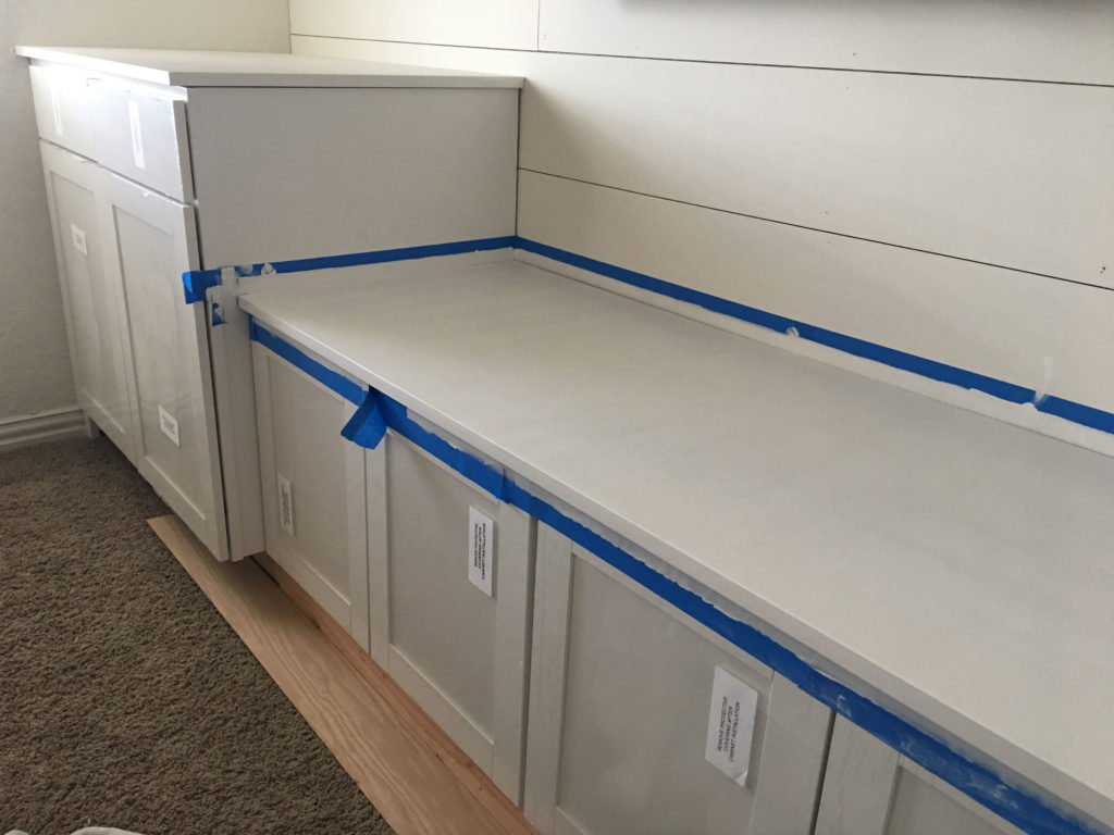 Bonus Room Makeover-DIY Builtin Storage and Bench Seat with Prefab Cabinets