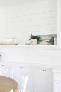 Transitional Dining Room-White built-in, vintage art, shiplap. Design and Styling by Iris Nacole