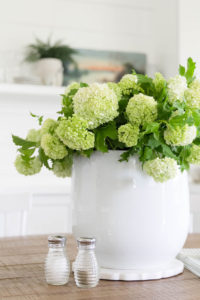 Transitional Dining Room-White built-in, vintage art, shiplap. Design and Styling by Iris Nacole