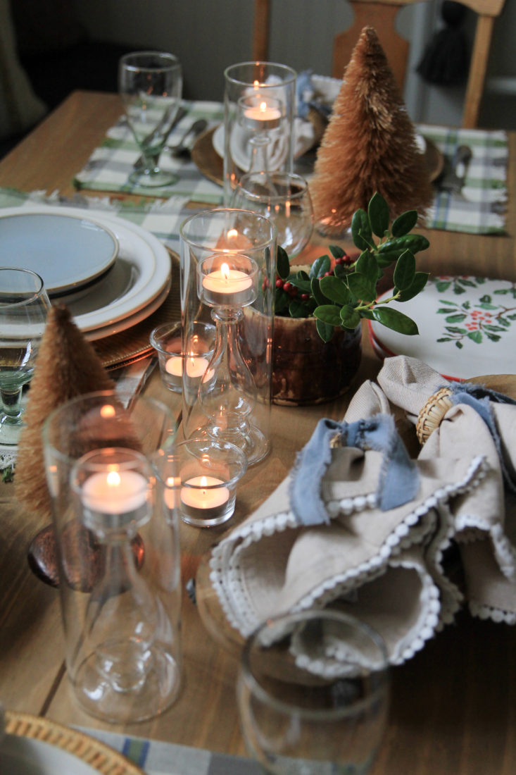 Holiday Tablescape with Glass Hurricanes and Glass Tealight Centerpiece